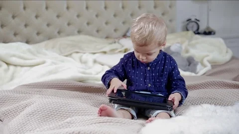 Adorable toddler with tablet. FULL HD Stock Footage 73967718