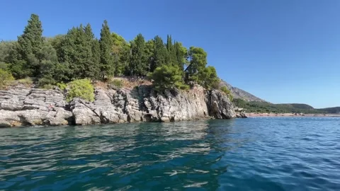 Adriatic Coastal Landscape with Limestone Cliffs and Sheltered Kayaking Water Stock Footage 346410601