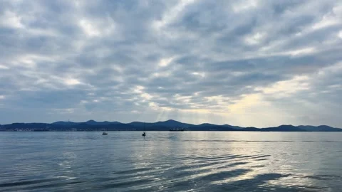 Adriatic Winter Calm with Reflections and Distant Boats Stock Footage 332562394