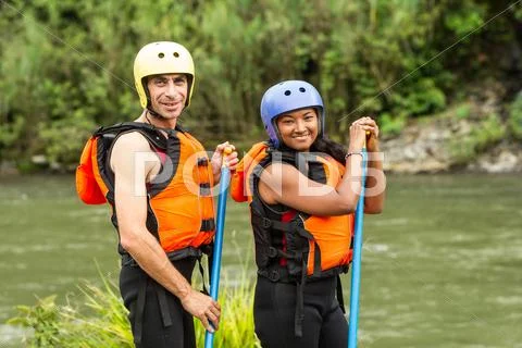 Adult Couple Prepared For White Water Rafting Trip Specific Equipment Stock Photos