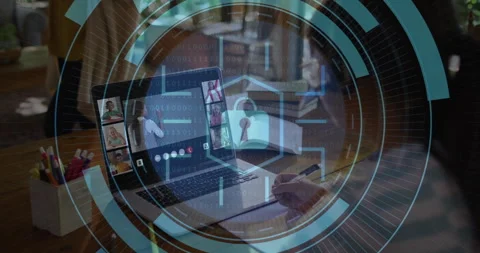 Adult hand writing notes during online class, showing cybersecurity overlay with Stock Footage 309111199