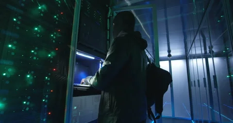Adult man hacking servers with computer Stock Footage 97203409