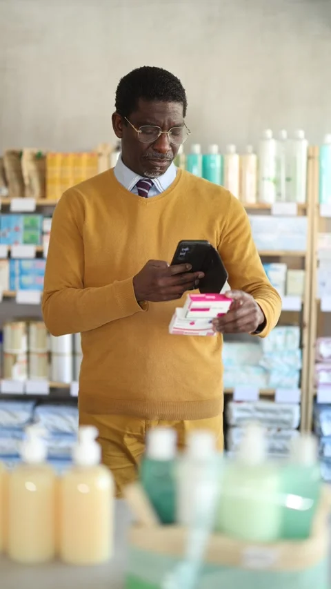 Adult man scanning qr code of paracetamol Stock Footage 320448290