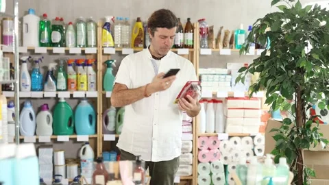 Adult man scanning qr code for razor Stock Footage 341525152