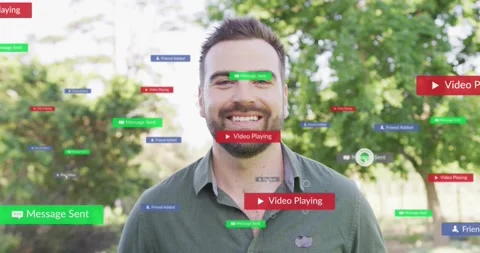 Adult man standing in park while UI badges appearing, cursor clicking, smiling, Stock Footage 333830223