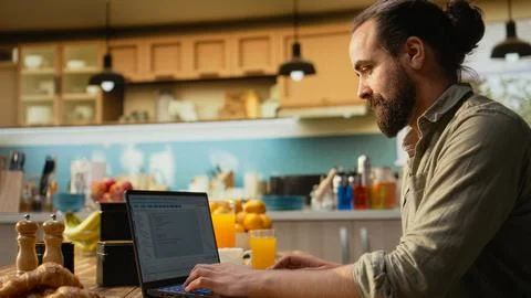 Adult programmer, developing web code, software systems on laptop Stockfoto's