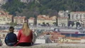 Adult woman and little boy talking and enjoying beautiful view of busy city HD Footage