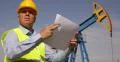 Adult Worker Check Visual Plans Blueprint Verification Oil Pump Extracting Field 4k or 4k+ Resolution