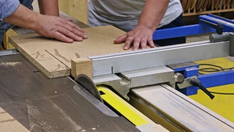 Adults Cutting Board on Table Saw Stock Footage 337551763