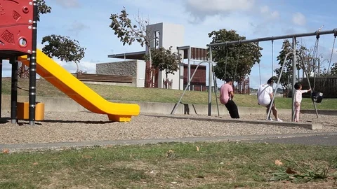 Adults on the swings 스톡 동영상 105214529