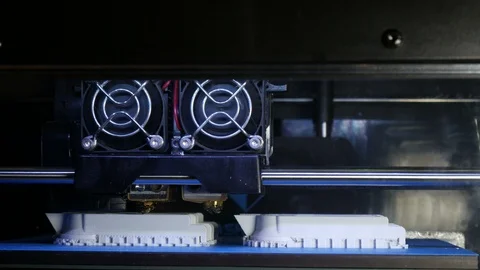 Advanced 3d printer in the factory prints a plastic product Stock Footage 88289465