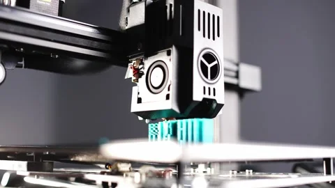 Advanced 3D printing process producing complex parts in a modern factory Stock Footage 319879609