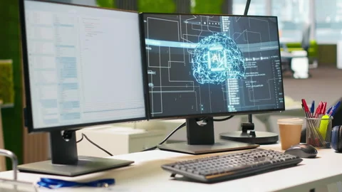 Advanced AI algorithms running on computer monitors in empty startup Stock Footage 313015679
