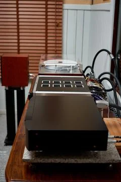 Advanced Audio Equipment Setup for High-Fidelity Listening in a Cozy Music Ro Stock Photos