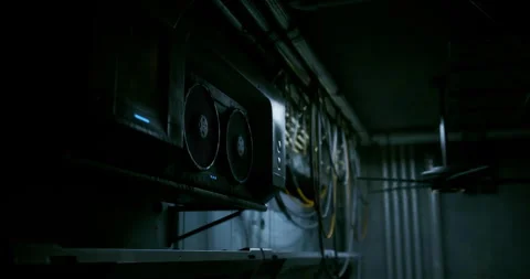 Advanced computer server setup in dimly lit technology space Stock Footage 309870641