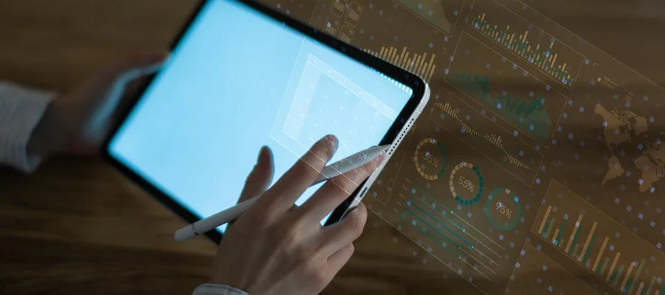 Advanced Financial Data Visualization and Market Analytics on a Digital Table Stock Photos