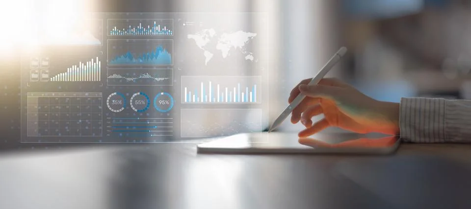 Advanced Financial Data Visualization and Market Analytics on a Digital Table Stock Photos