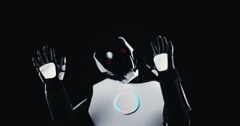 Advanced Humanoid Robot with LED Eyes Simulating Human Behavior Dancing Like Stock Footage 320057565