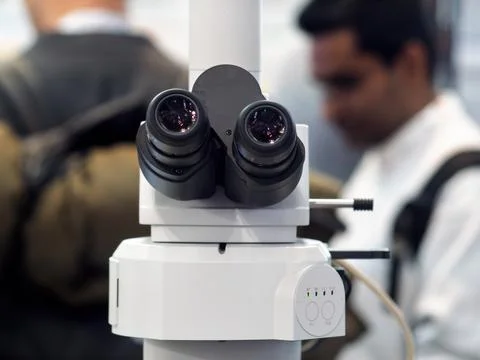 Advanced Laboratory Microscope Focusing on Light and Clarity Stock Photos