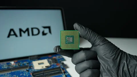 Advanced Micro Devices AMD background display, American semiconductor compa.. Vídeos de archivo 335086490