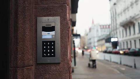 An advanced modern intercom system installed on the exterior of a building Stock Footage 299474960