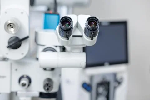 Advanced Operating Microscope for Surgical Procedures in Medical Settings Stock Photos