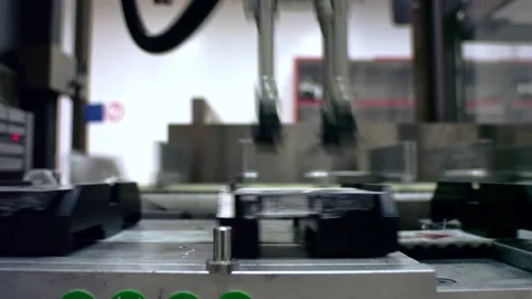 Advanced robotic arm packaging assembling vaccine ampoules in mass production Stock Footage 248833620