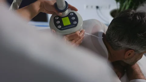 Advanced Therapy Treatment in a Medical Setting, focusing on enhancing patient Stock Footage 314965951
