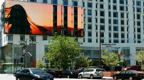 Advanced visual digital electronic billboard on the building in Los Angeles Stock Footage