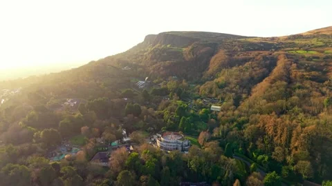Advancing 4K 60FPS aerial view of Cave Hill and Belfast Zoo in North Belfast Stock Footage 325846023