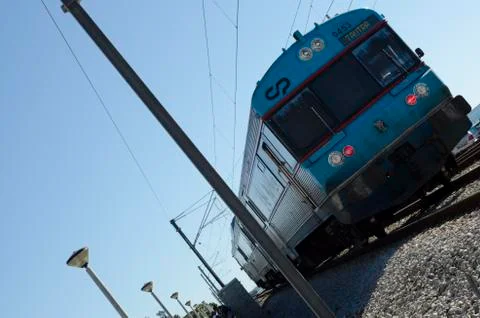 An advancing blue train Stock Photos