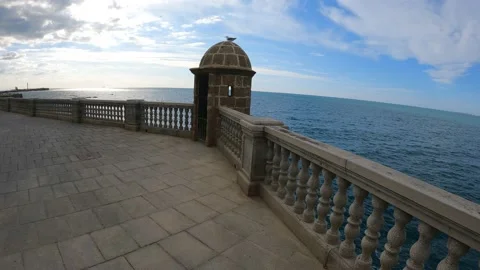 Advancing through the walled area of the Cádiz promenade in Andalusia Stock Footage 171621112