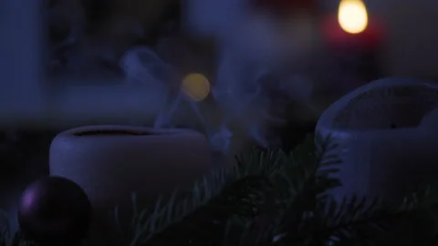 Advent candle from Advent wreath being extinguished, 4k, Stock Footage Stock Footage 144540048