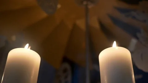Advent white candles over that revolve decorations made of plywood dep Stock Footage 71003089