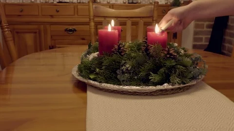 Advent wreath lighting candles Video stock 122336901
