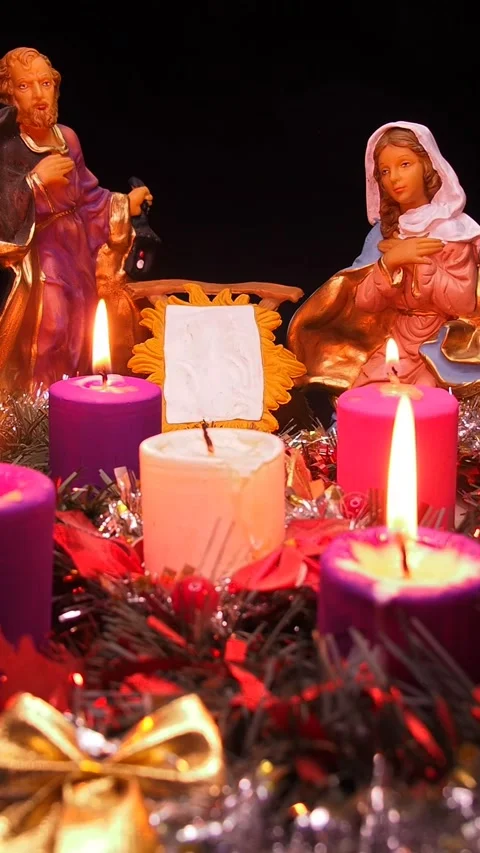Advent wreath next to nativity scene with holy family Stock Footage 341691896