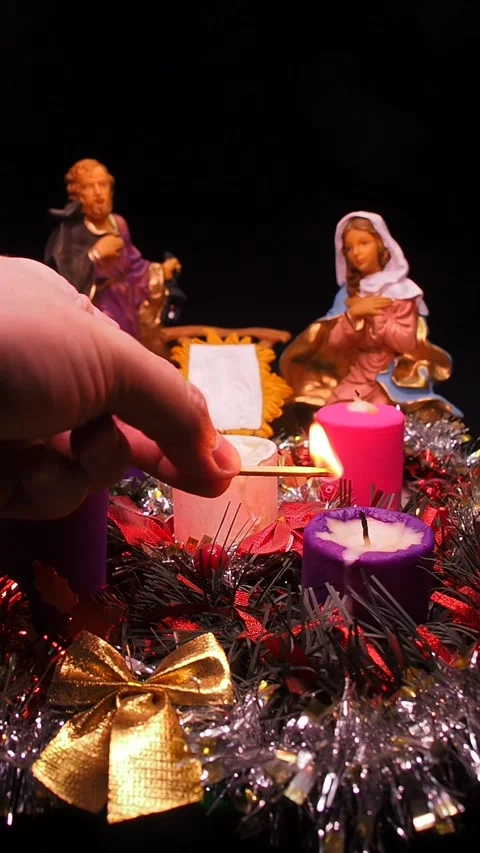 Advent wreath next to nativity scene with holy family Stock Footage 341691899