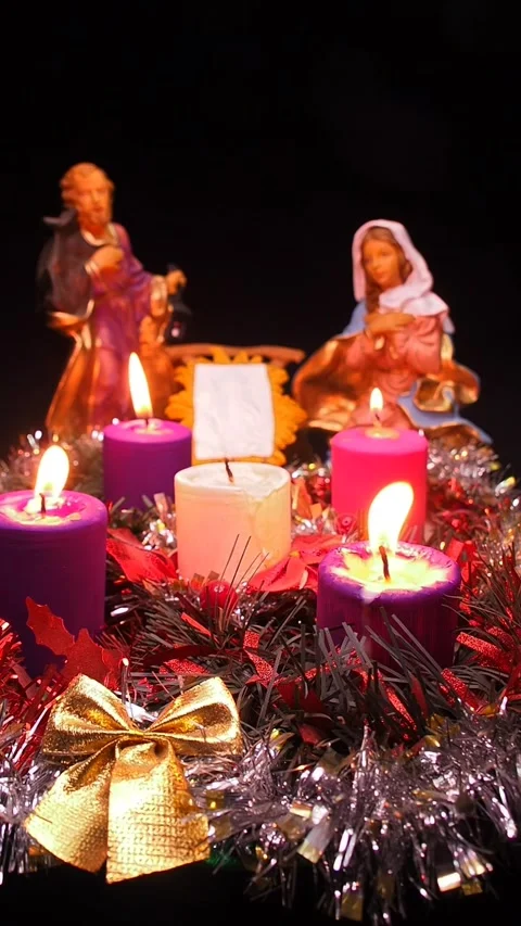 Advent wreath next to nativity scene with holy family Stock Footage 341691940