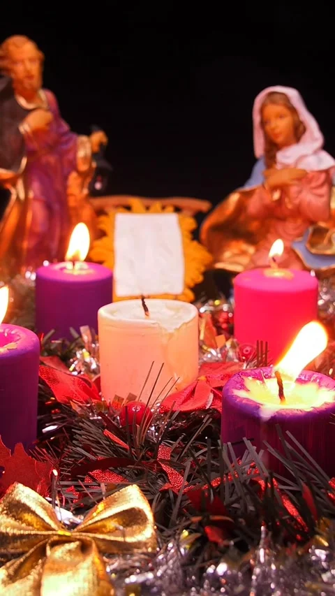 Advent wreath next to nativity scene with holy family Stock Footage 341691941