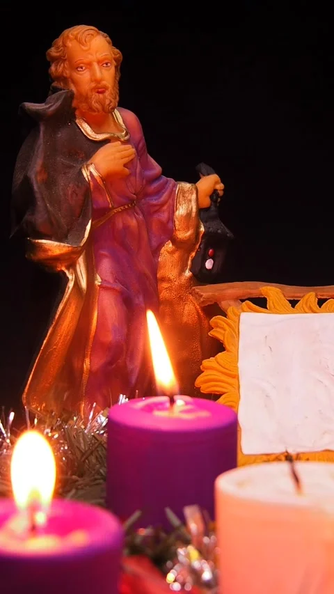 Advent wreath next to nativity scene with holy family Stock Footage 341691942