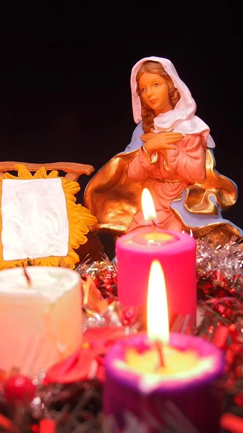 Advent wreath next to nativity scene with holy family Stock Footage 341691944