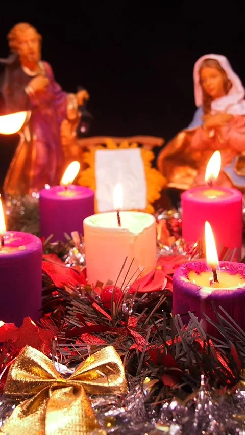 Advent wreath next to nativity scene with holy family Stock Footage 341691945