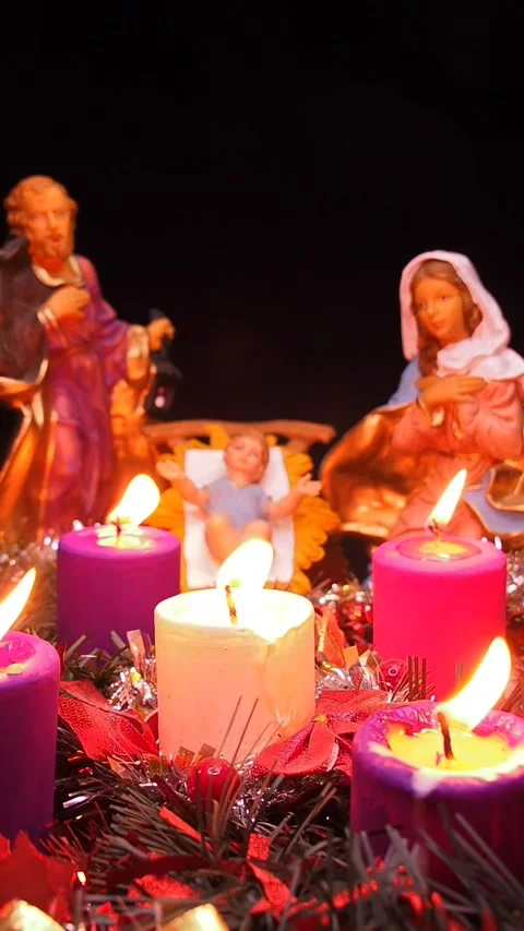 Advent wreath next to nativity scene with holy family Stock Footage 341691965