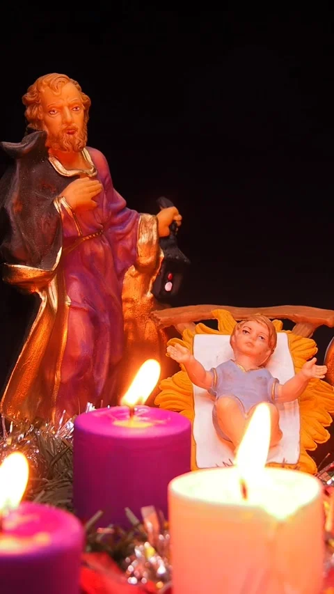 Advent wreath next to nativity scene with holy family Stock Footage 341691967