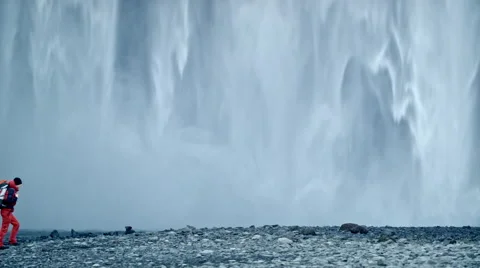 Adventure man waterfall Video stock 53087034