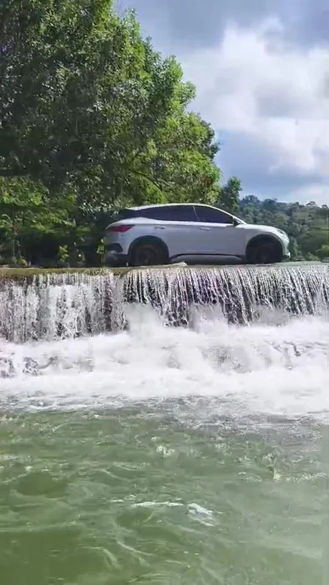 Adventure Meets Serenity by the Waterfall Stock Footage 329091864