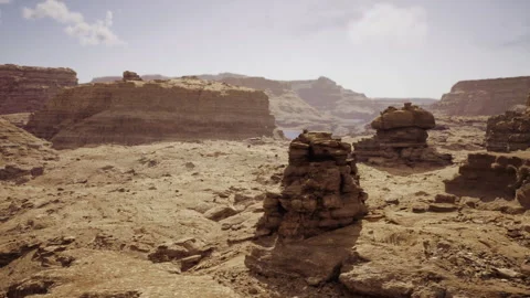 Adventurers navigate perilous pathways amid scorching desert environment Video stock 331398128