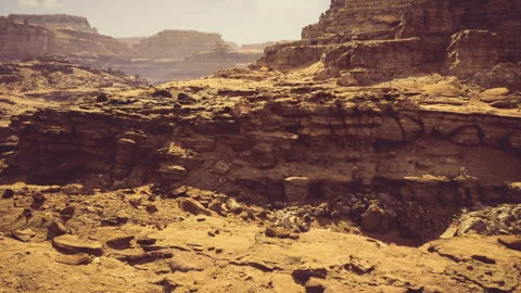 Adventurers navigate perilous pathways amid scorching desert environment Stock Footage 341563238