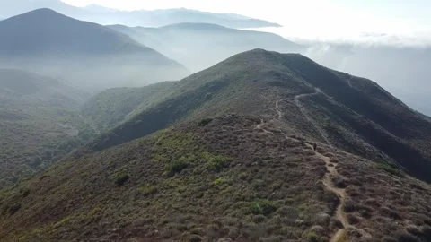 Adventurous Hiker Explores Mountain Peak by Drone Video stock 281513426