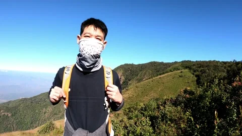 Adventurous Hiker on Mountain Trail Stock Footage 314995377